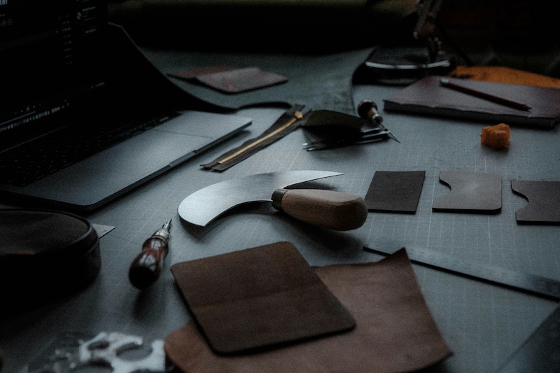 Artisan crafting luxury bag